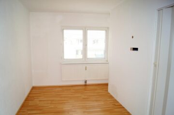 Schlafzimmer mit begehbarem Kleiderschrank